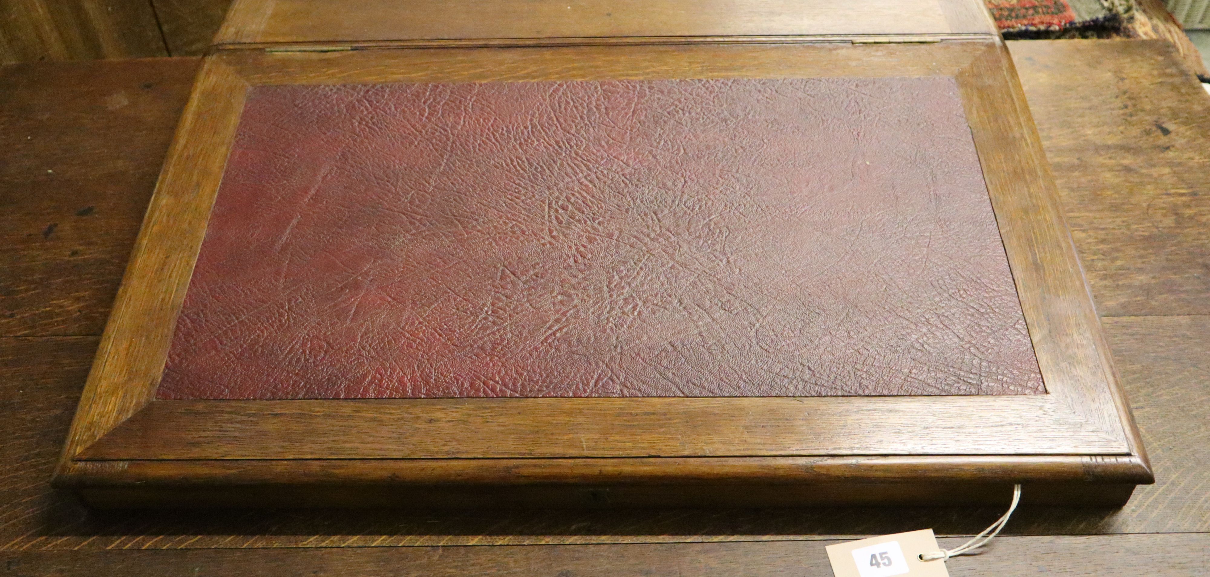 A late Victorian oak and mahogany writing slope, width 70cm, depth 54cm